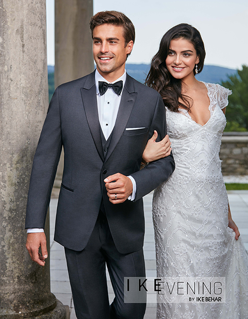 Groom in Grey Tuxedo along with Bride in Gown Foresto Tuxedo, Mineola.